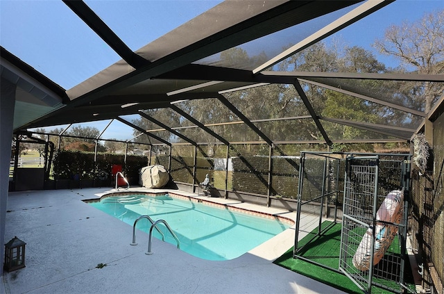 pool featuring a patio area and a lanai