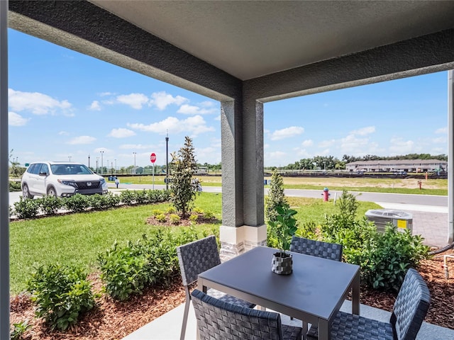 view of patio with outdoor dining area