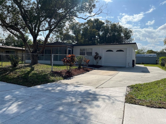 view of front of property with a garage, fence, concrete driveway, and stucco siding