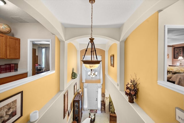 interior space with a textured ceiling