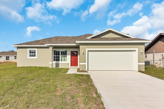 ranch-style house with driveway, stucco siding, an attached garage, and a front yard