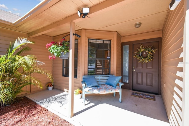 entrance to property with a porch