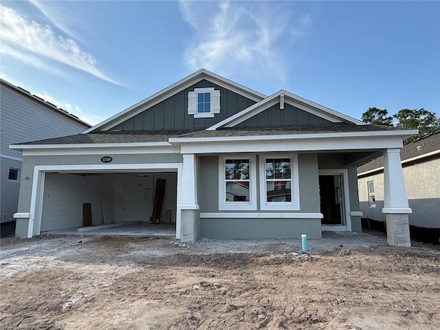 view of front of property featuring board and batten siding and an attached garage
