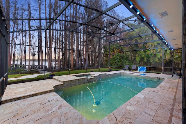5524 Sail Ct, Orlando, FL 32819 - view of pool with a patio, glass enclosure, and a pool with connected hot tub