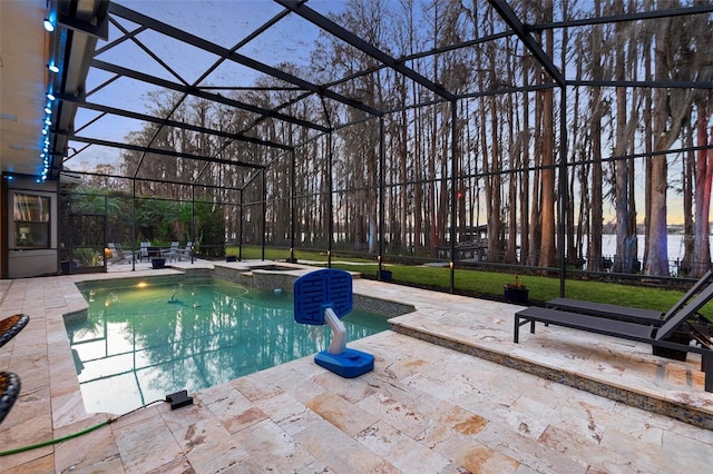 5524 Sail Ct, Orlando, FL 32819 - view of swimming pool featuring a patio area, a pool with connected hot tub, and glass enclosure