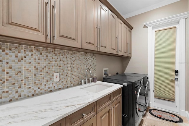 5524 Sail Ct, Orlando, FL 32819 - laundry room with cabinet space and washer and dryer