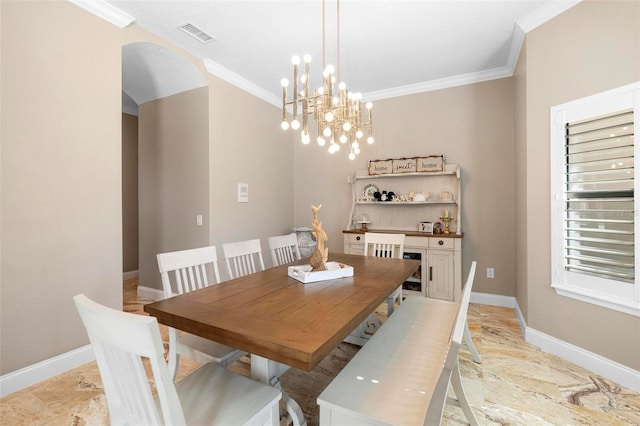 5524 Sail Ct, Orlando, FL 32819 - dining area with crown molding, a chandelier, baseboards, and light marble finish floors