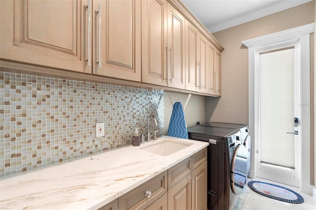 5524 Sail Ct, Orlando, FL 32819 - washroom featuring cabinet space, separate washer and dryer, and ornamental molding