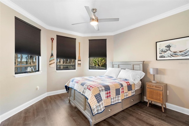 5524 Sail Ct, Orlando, FL 32819 - bedroom featuring dark wood-style flooring, baseboards, ornamental molding, and a ceiling fan