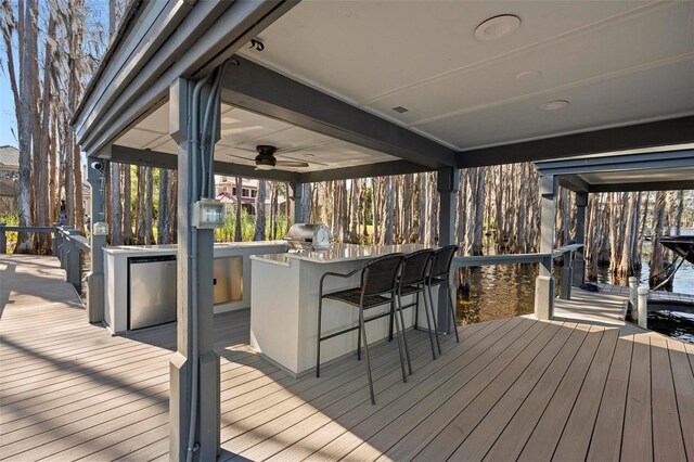 5524 Sail Ct, Orlando, FL 32819 - wooden deck featuring grilling area