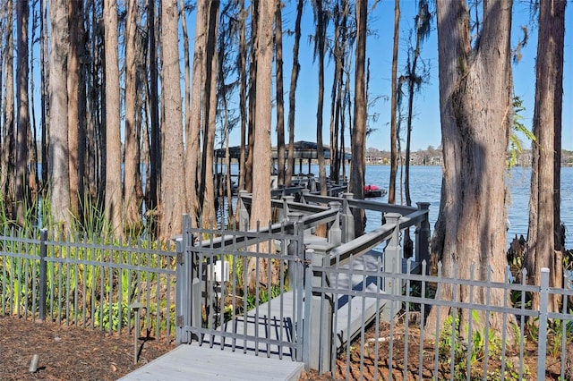 5524 Sail Ct, Orlando, FL 32819 - dock with a gate and a water view
