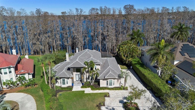 5524 Sail Ct, Orlando, FL 32819 - view of subject property with a heavily wooded area