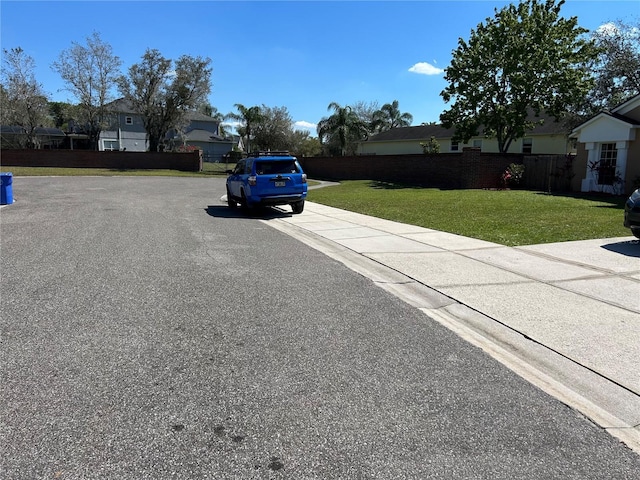 view of street featuring curbs and sidewalks