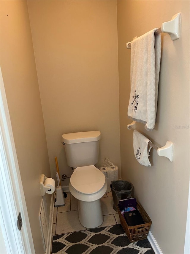 bathroom featuring tile patterned floors and toilet