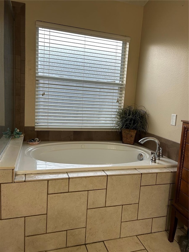 full bathroom featuring a garden tub