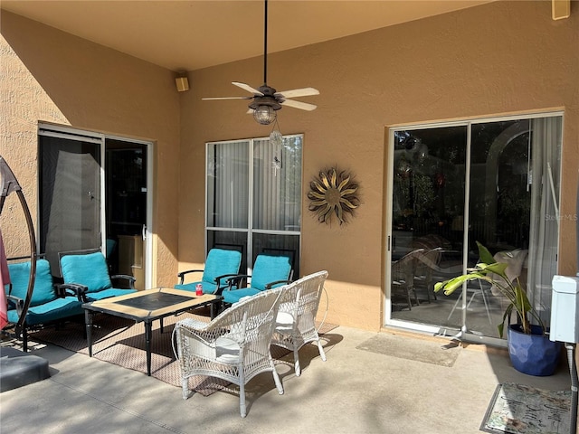 view of patio / terrace featuring outdoor lounge area and ceiling fan