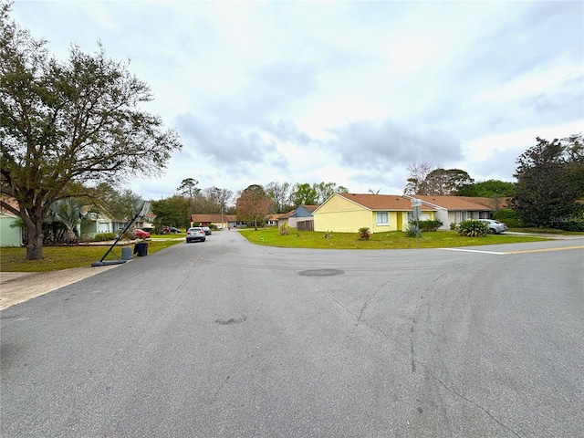 view of road with a residential view