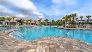 community pool with a patio