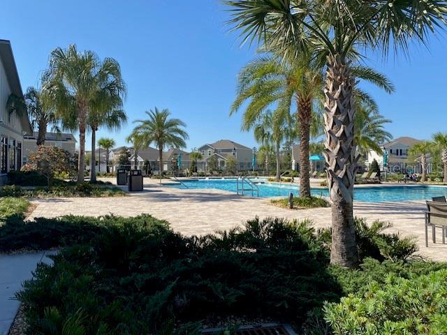 community pool featuring a patio