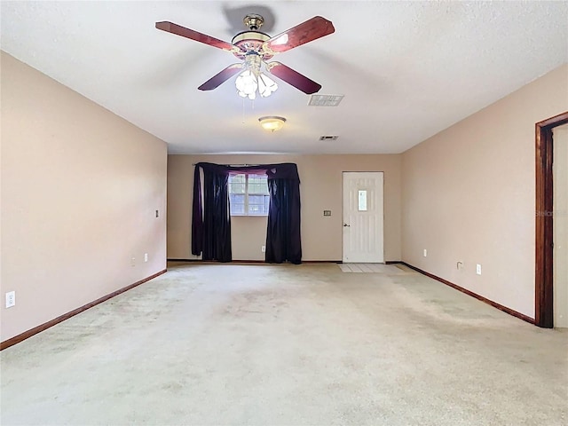 15523 Old Cheney Hwy, Orlando, FL 32828 - spare room with baseboards, light colored carpet, and ceiling fan