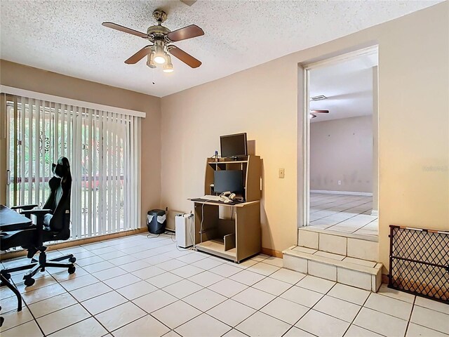 15523 Old Cheney Hwy, Orlando, FL 32828 - office area with a ceiling fan, a textured ceiling, light tile patterned floors, and baseboards