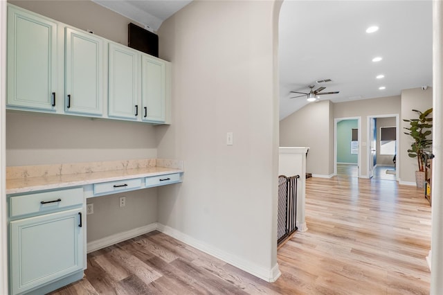 clothes washing area featuring light wood-style floors, recessed lighting, baseboards, and a ceiling fan