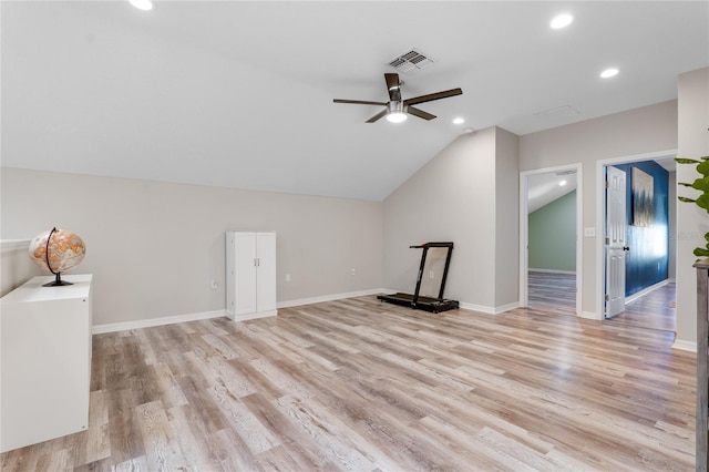 additional living space with vaulted ceiling, baseboards, light wood-style flooring, and recessed lighting