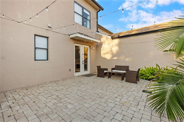 view of patio / terrace with an outdoor hangout area and french doors