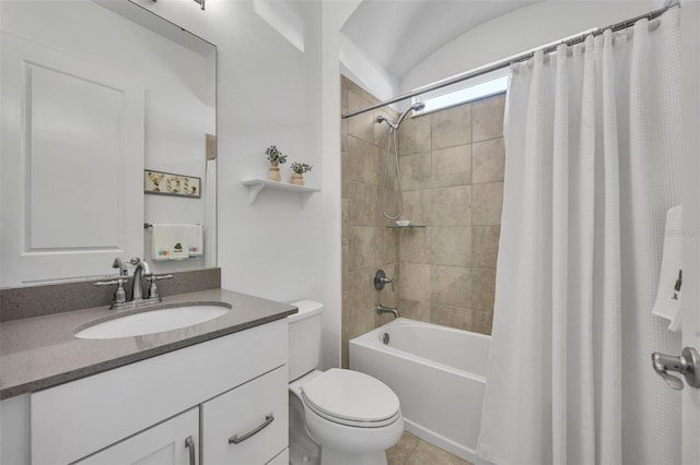 bathroom with vanity, toilet, and shower / bath combo with shower curtain