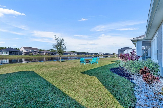 view of yard with a water view