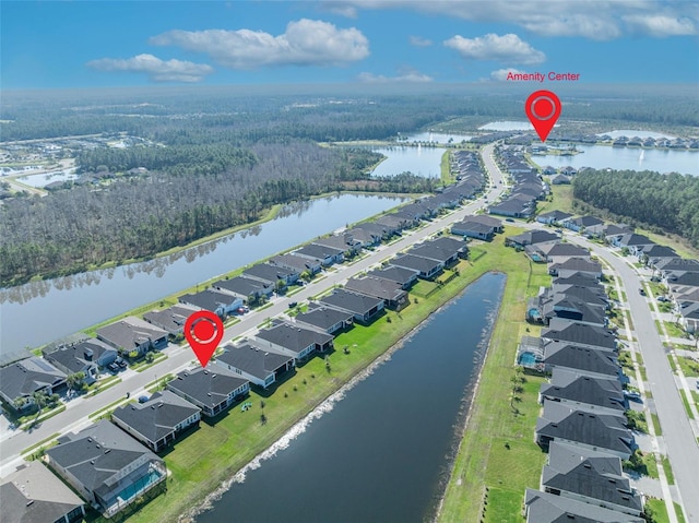 aerial view featuring a residential view and a water view