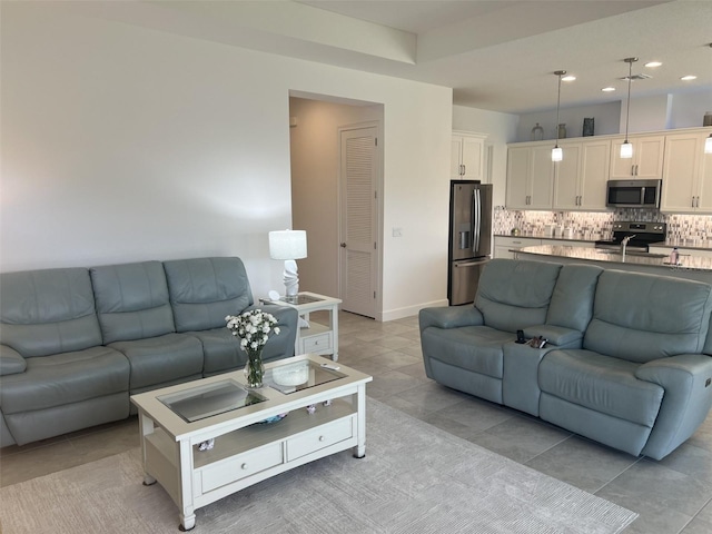 585 Mosaic Blvd, Daytona Beach, FL 32124 - living area featuring visible vents, recessed lighting, baseboards, and light tile patterned floors