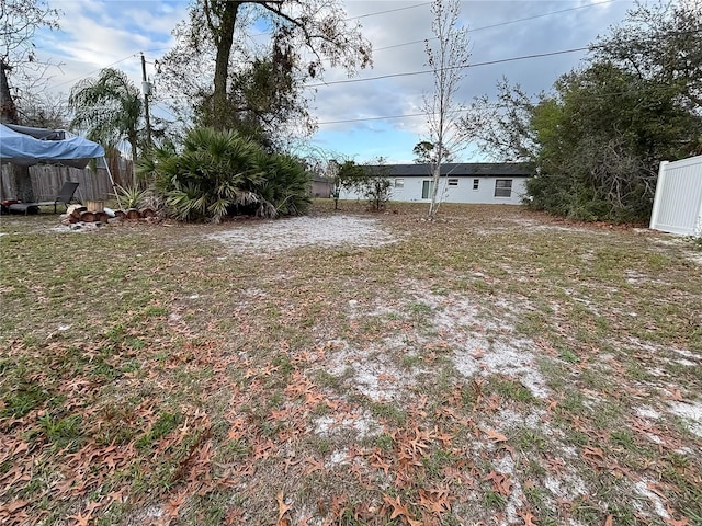 view of yard with fence