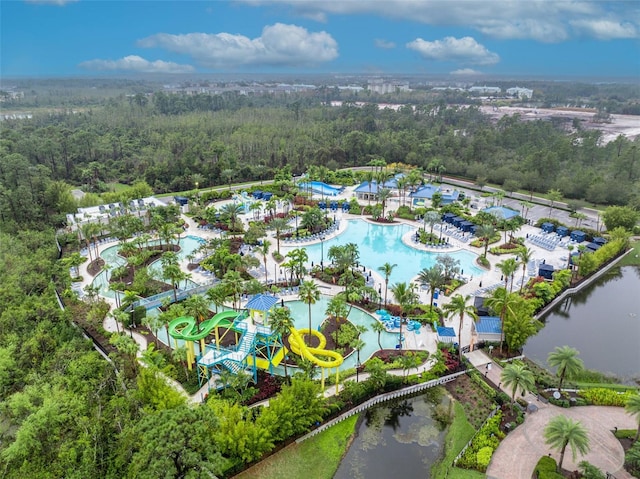 bird's eye view featuring a wooded view