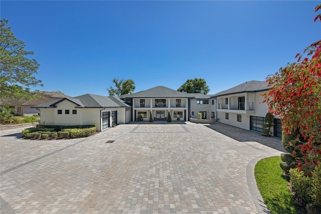 3120 Downs Cove Rd, Windermere, FL 34786 - view of front of house featuring driveway and stucco siding