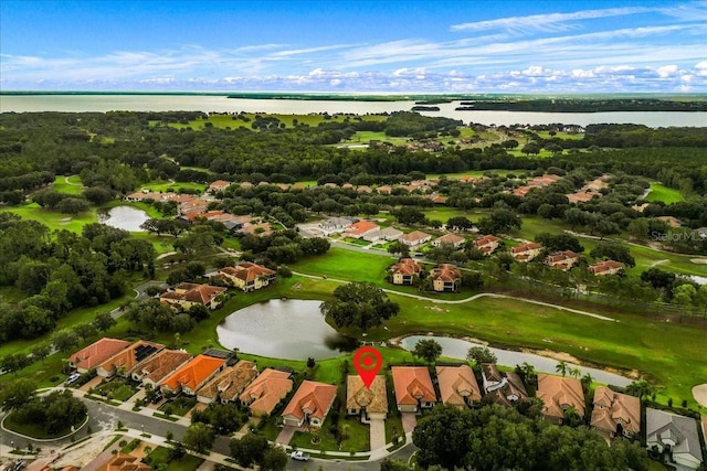 bird's eye view featuring a water view and a residential view