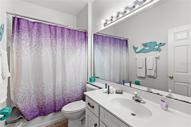 full bathroom with shower / bathtub combination with curtain, vanity, toilet, and tile patterned floors