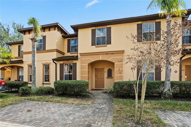 view of property with stucco siding