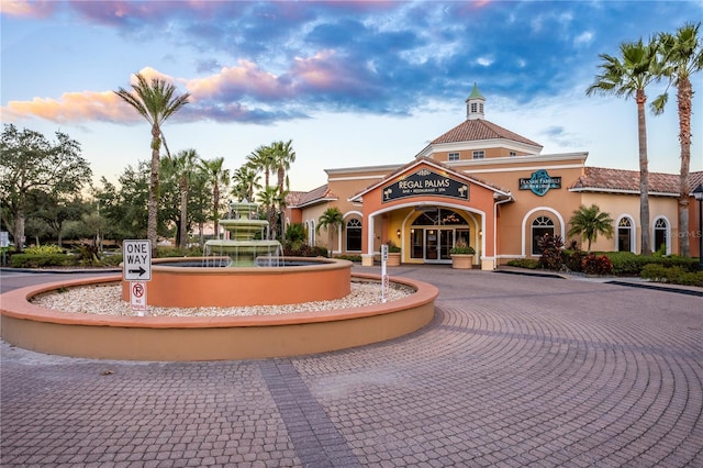 view of community featuring curved driveway