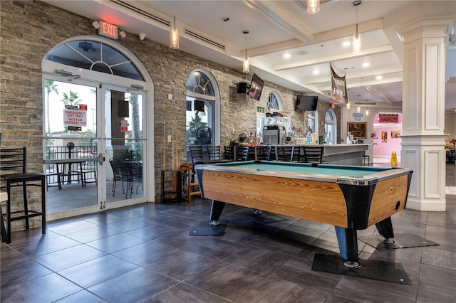 recreation room with a bar, ornate columns, beam ceiling, and pool table