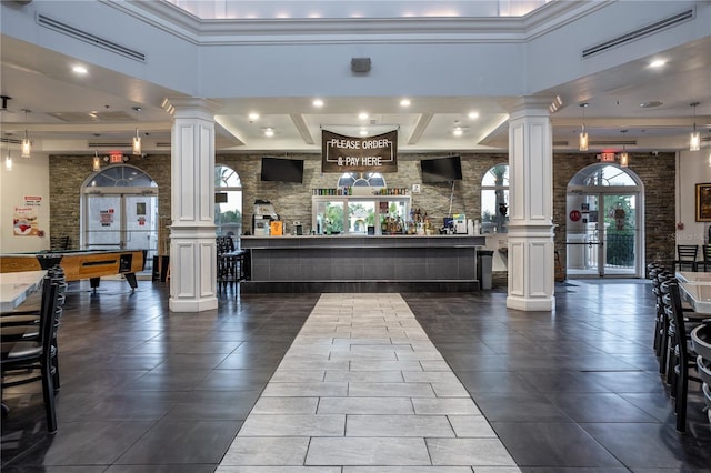 welcome area with french doors, visible vents, and ornate columns