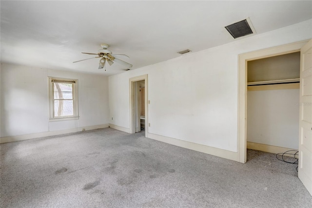 unfurnished bedroom with light carpet, ceiling fan, visible vents, and baseboards