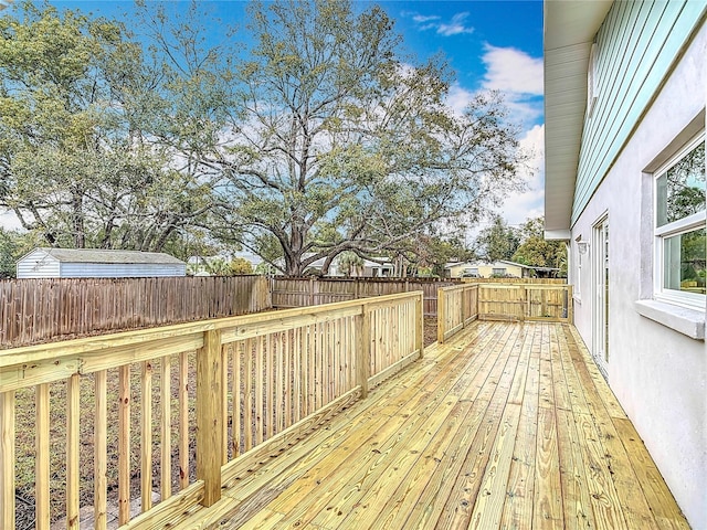 deck with a fenced backyard