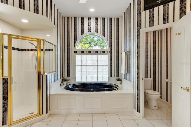 bathroom featuring wallpapered walls, a shower stall, tile patterned flooring, and a bath