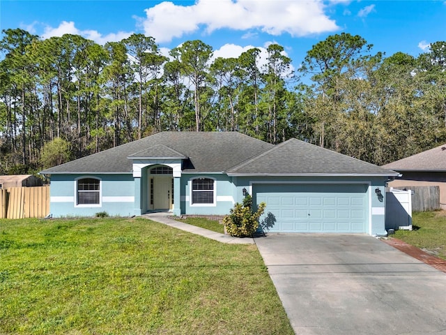 ranch-style house with a garage, fence, driveway, stucco siding, and a front lawn