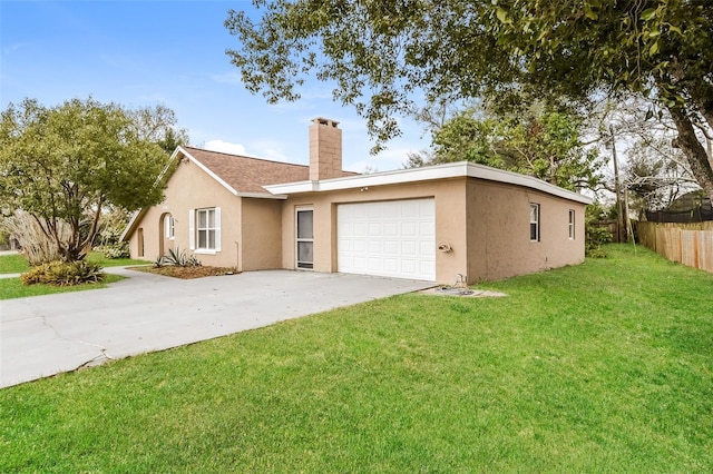 ranch-style home with an attached garage, a front lawn, concrete driveway, and stucco siding