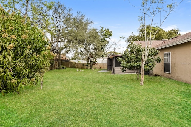 view of yard featuring a fenced backyard