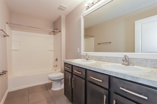 bathroom featuring tile patterned flooring, a sink, bathing tub / shower combination, and double vanity