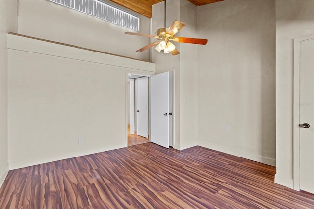2297 Burnway Rd Unit 2297, Haines City, FL 33844 - unfurnished bedroom featuring wooden ceiling, ceiling fan, a high ceiling, and wood finished floors