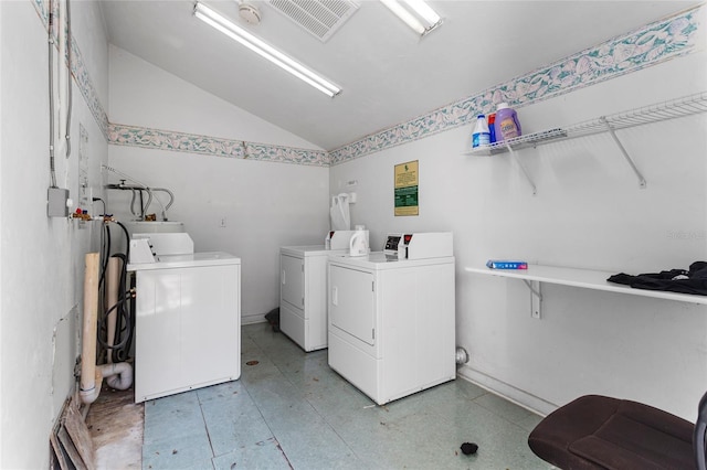 2297 Burnway Rd Unit 2297, Haines City, FL 33844 - clothes washing area with washer and dryer, visible vents, and water heater
